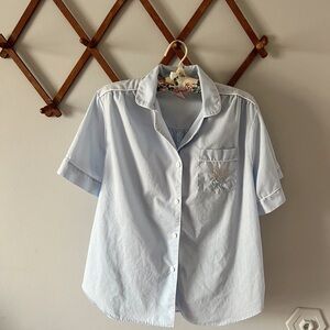 Darling lightweight button up vintage blue shirt with bow embroidery detail